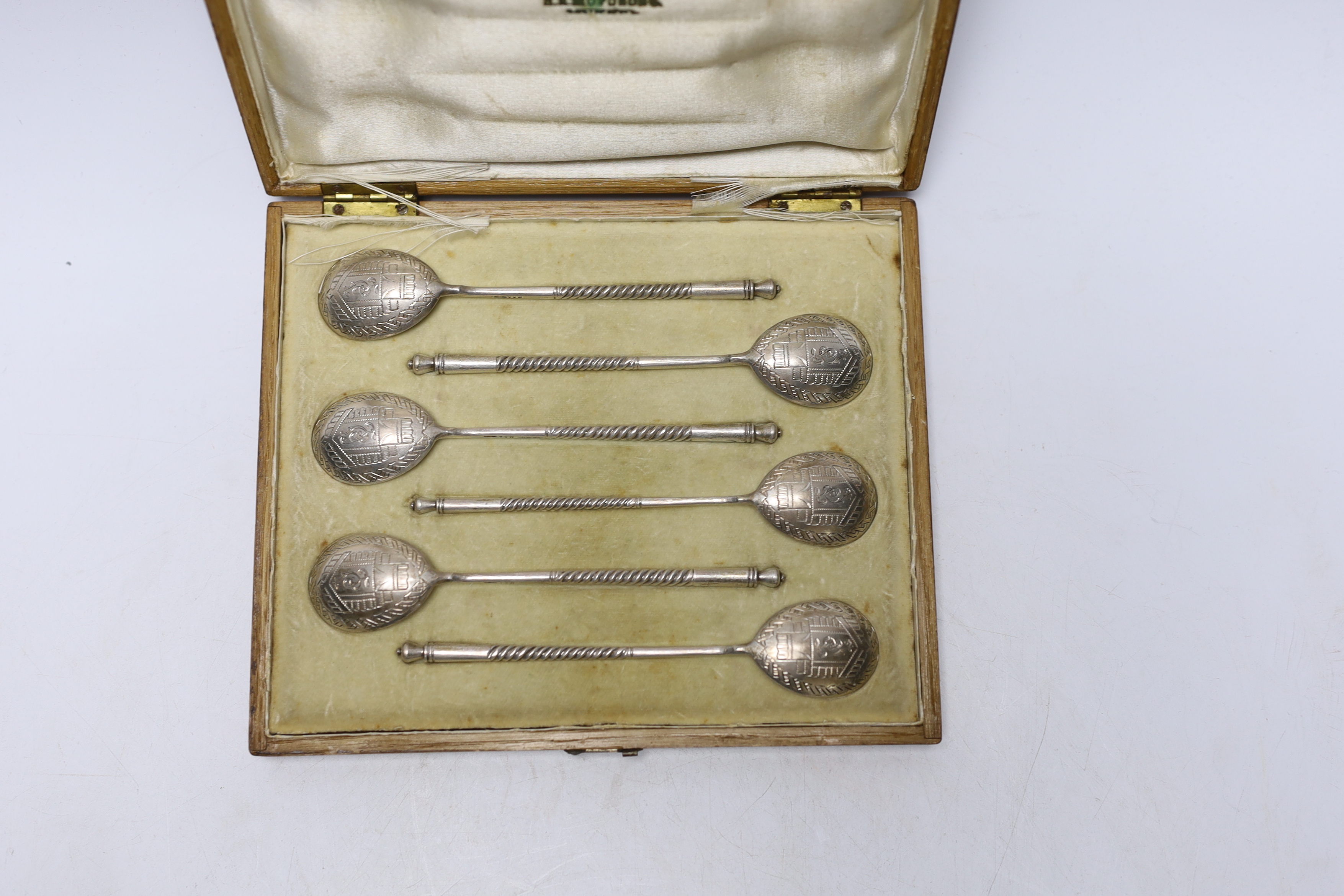 A cased set of six late 19th/early 20th century Russian 84 zolotnik teaspoons with engraved bowls, master, Matryena Andreyevna? 12.8cm.